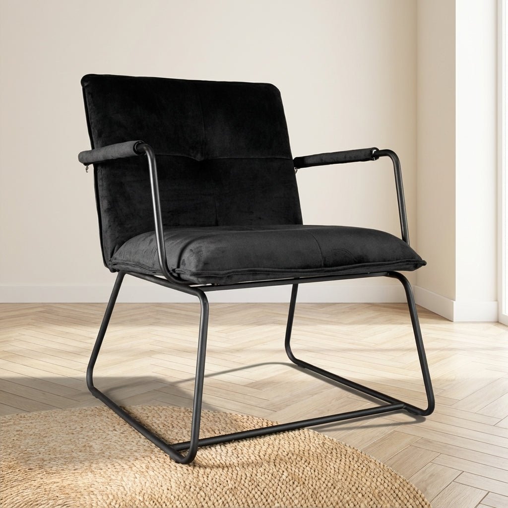 Hailey velvet black armchair atmospheric photo in a modern interior