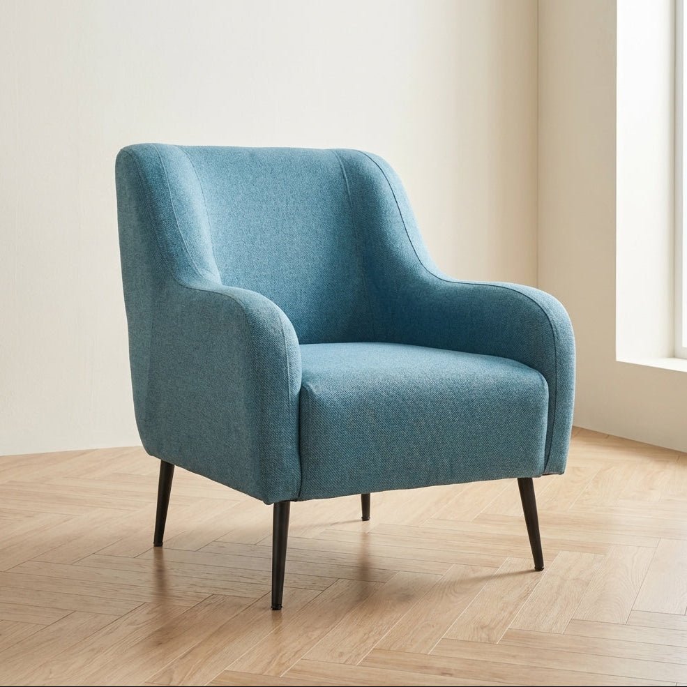 Armchair Revos Turquoise atmospheric photo in a modern interior