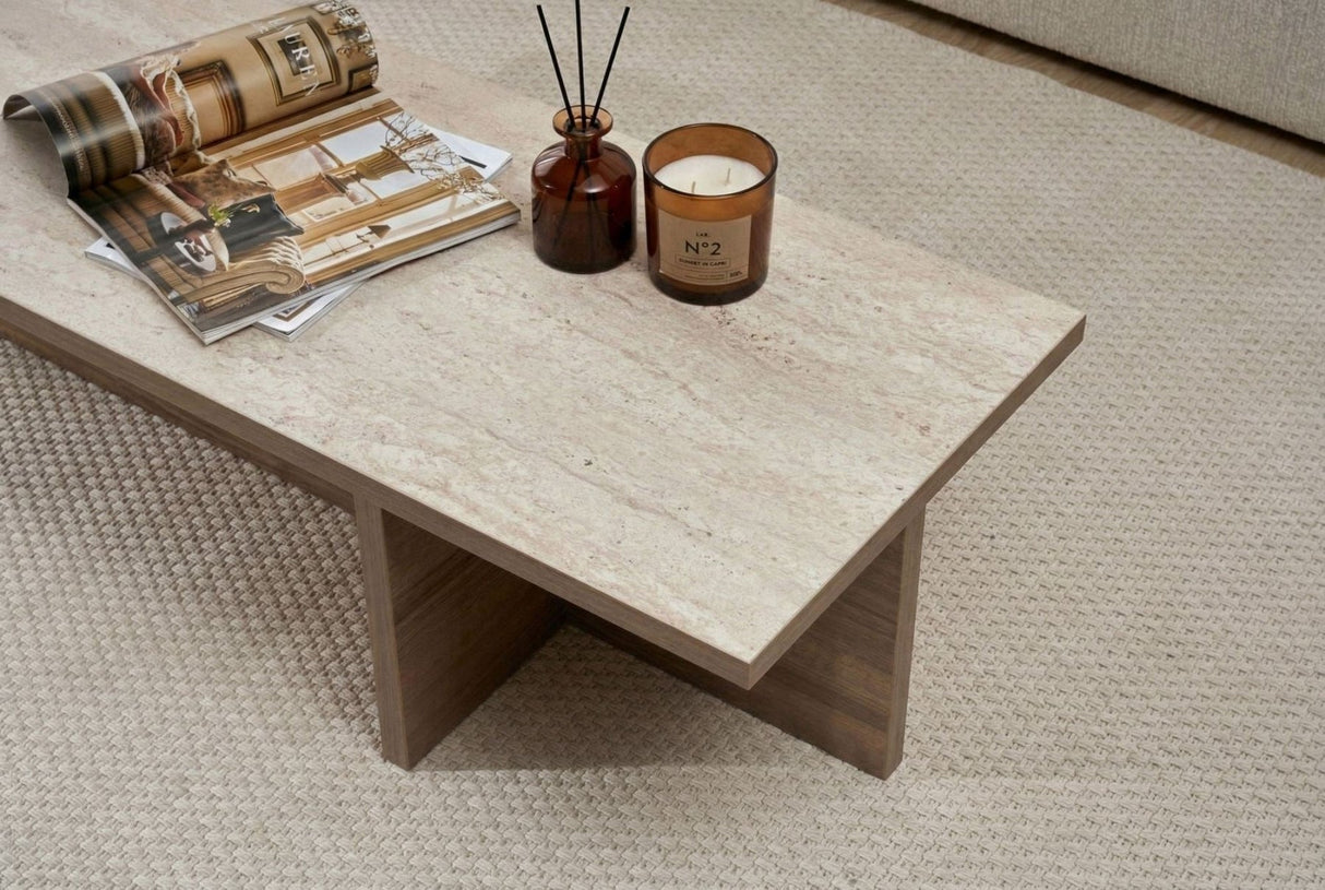 Modern rectangular coffee table with travertine top and walnut melamine base. Dimensions: 120 x 45 x 30 cm.