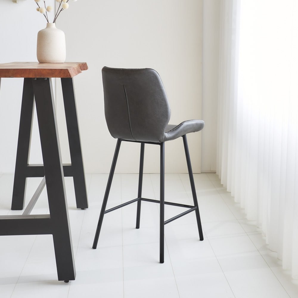 Bar stool Beau artificial leather Dimehouse Anthracite LxWxH 82x54x52 Faux leather Atmospheric photo diagonal rear view