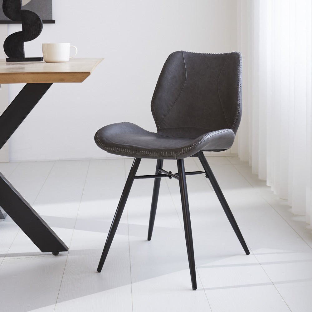 Dining room chair Beau artificial leather Dimehouse Anthracite LxWxH 72x68x50 Faux leather Atmospheric photo diagonal front view