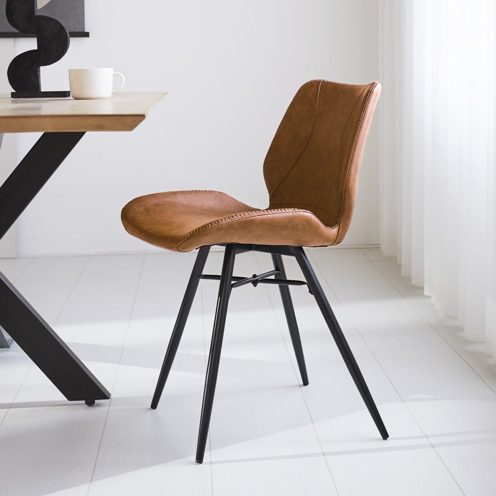 Dining room chair Beau artificial leather Dimehouse Cognac LxWxH 72x68x50 Faux leather Atmospheric photo side view