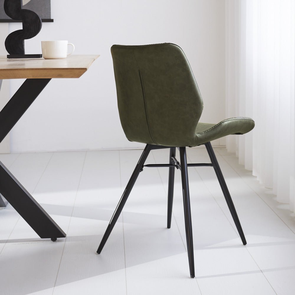 Dining room chair Beau artificial leather Dimehouse Green LxWxH 72x68x50 Faux leather Atmospheric photo diagonal rear view