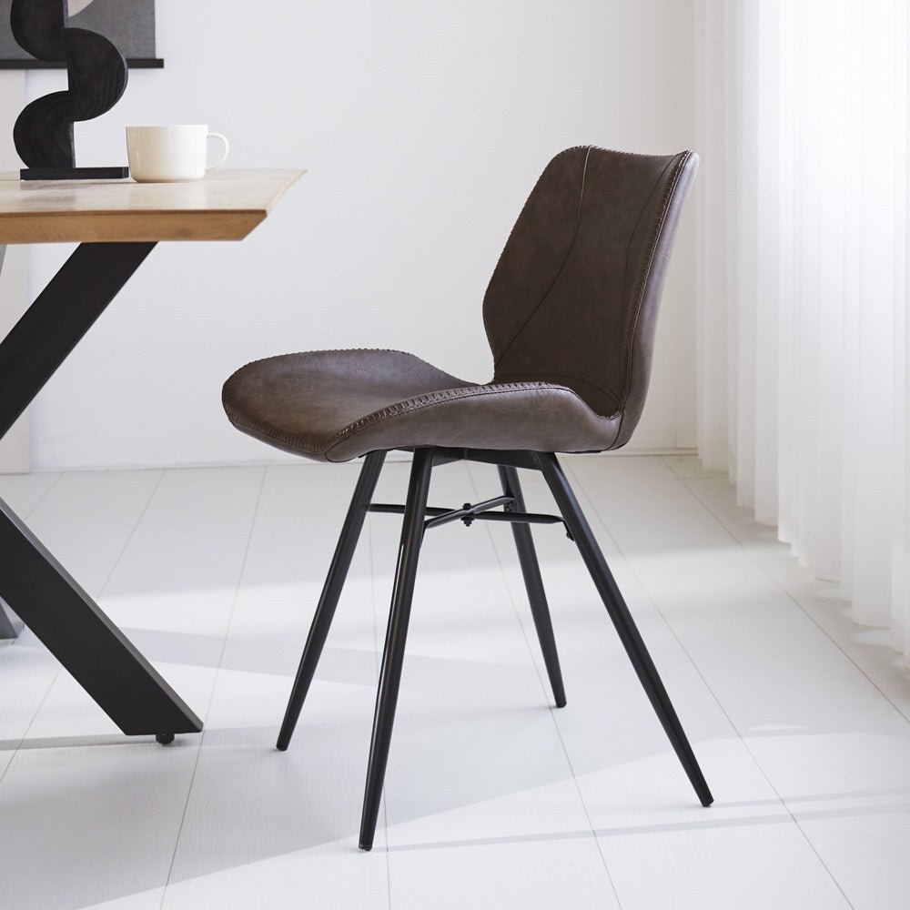 Dining room chair Beau artificial leather Dimehouse Taupe LxWxH 72x68x50 Faux leather Atmospheric photo side view