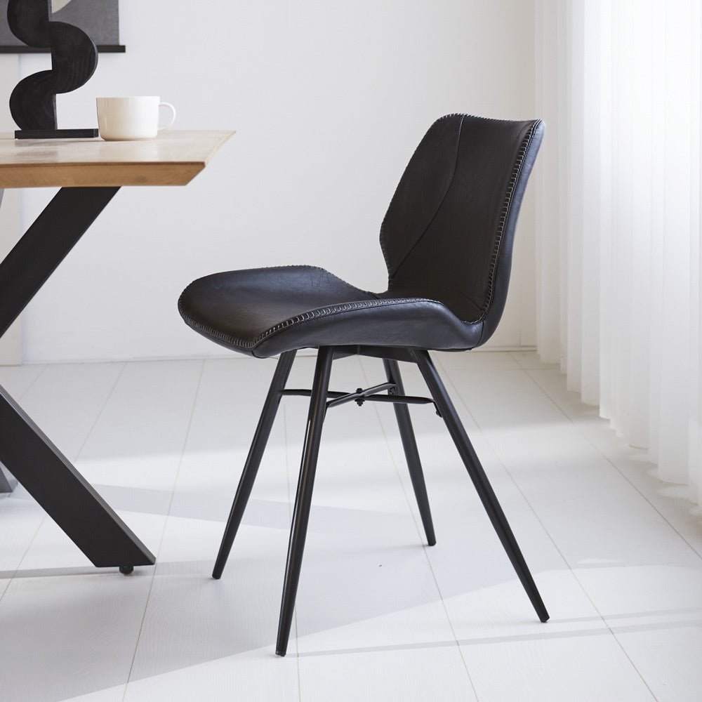 Dining room chair Beau artificial leather Dimehouse Black LxWxH 72x68x50 Faux leather Atmospheric photo side view