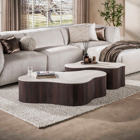 Set of 2 organic Cruz Grand coffee tables with Taj Mahal ceramic tops and dark brown ribbed base.