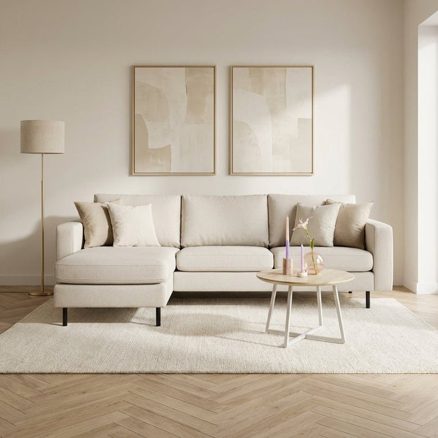 Hoekbank Merle ivoor stof links/rechts sfeerfoto in modern interieur