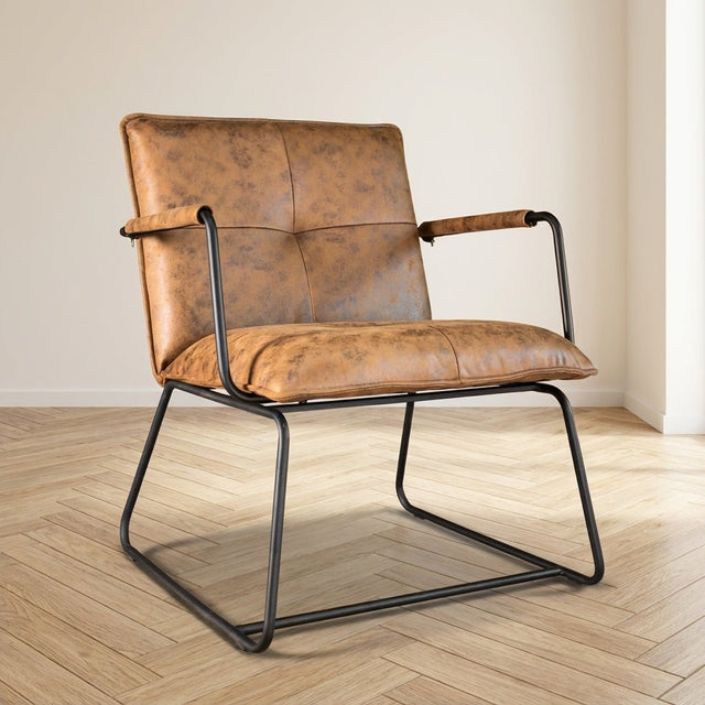 Industriële fauteuil Hailey cognac eco-leer sfeerfoto in modern interieur