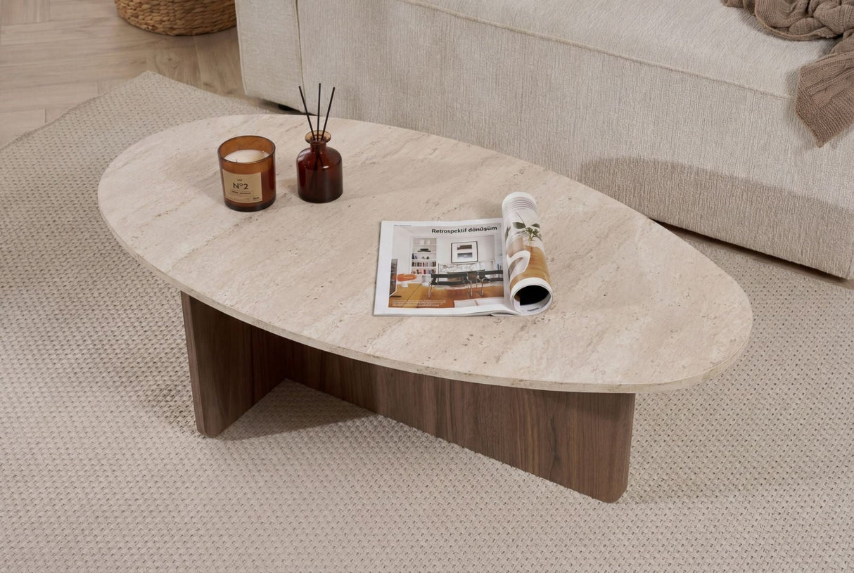 Organic pebble-shaped coffee table with a travertine-look top and walnut melamine base. Japandi design of 120x60cm.