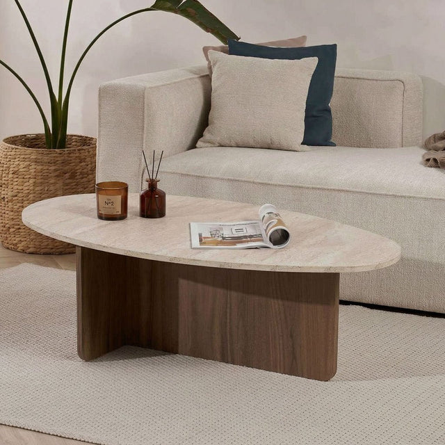 Organic pebble-shaped coffee table with a travertine-look top and walnut melamine base. Japandi design of 120x60cm.