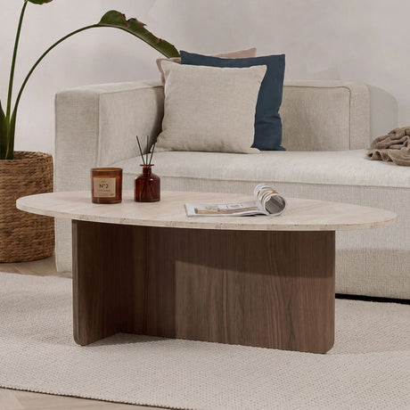Organic pebble-shaped coffee table with a travertine-look top and walnut melamine base. Japandi design of 120x60cm.