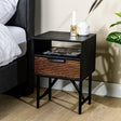 Bedside table Karel DH Interior Black Acacia wood Atmospheric photo diagonal front view