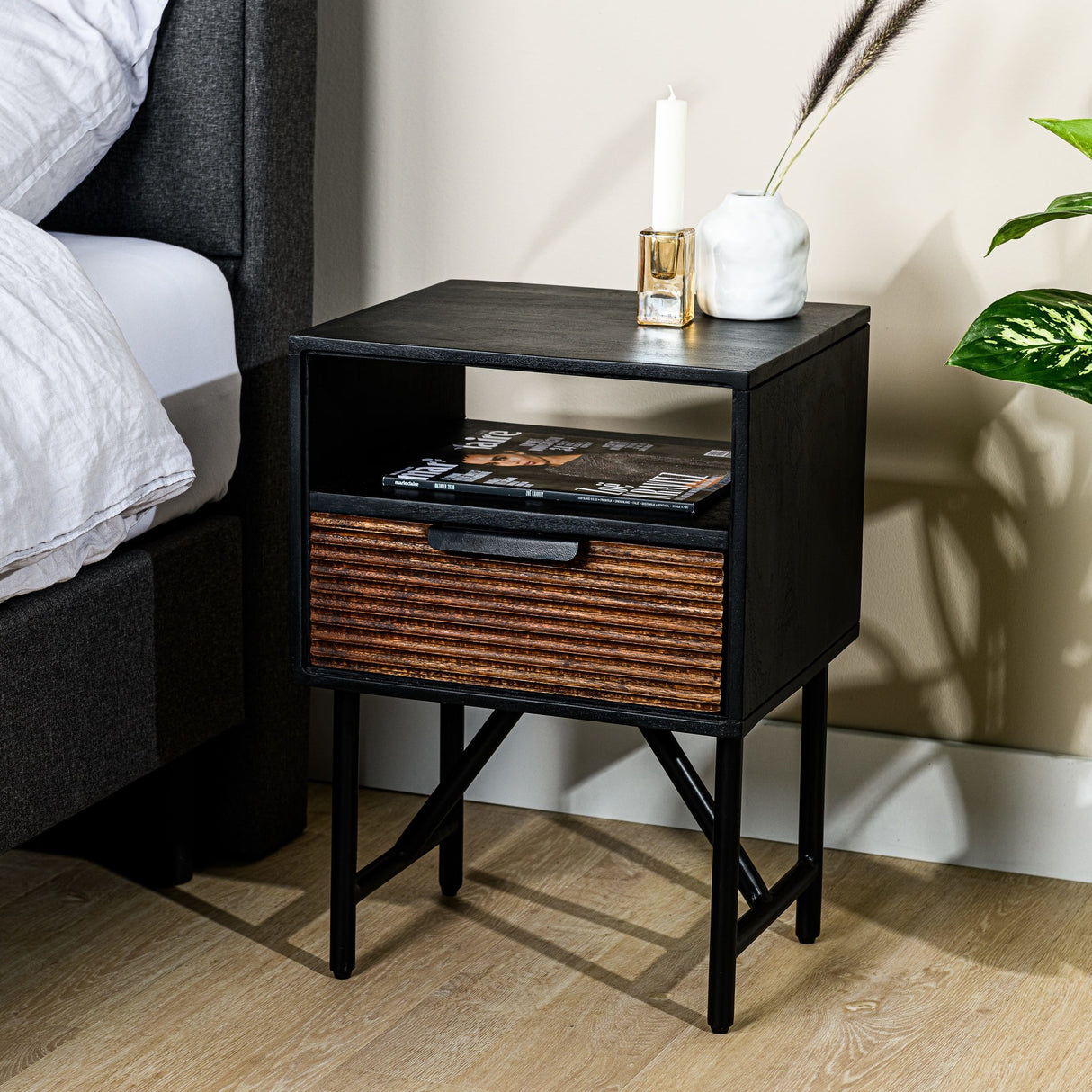 Bedside table Karel DH Interior Black Acacia wood Atmospheric photo diagonal front view