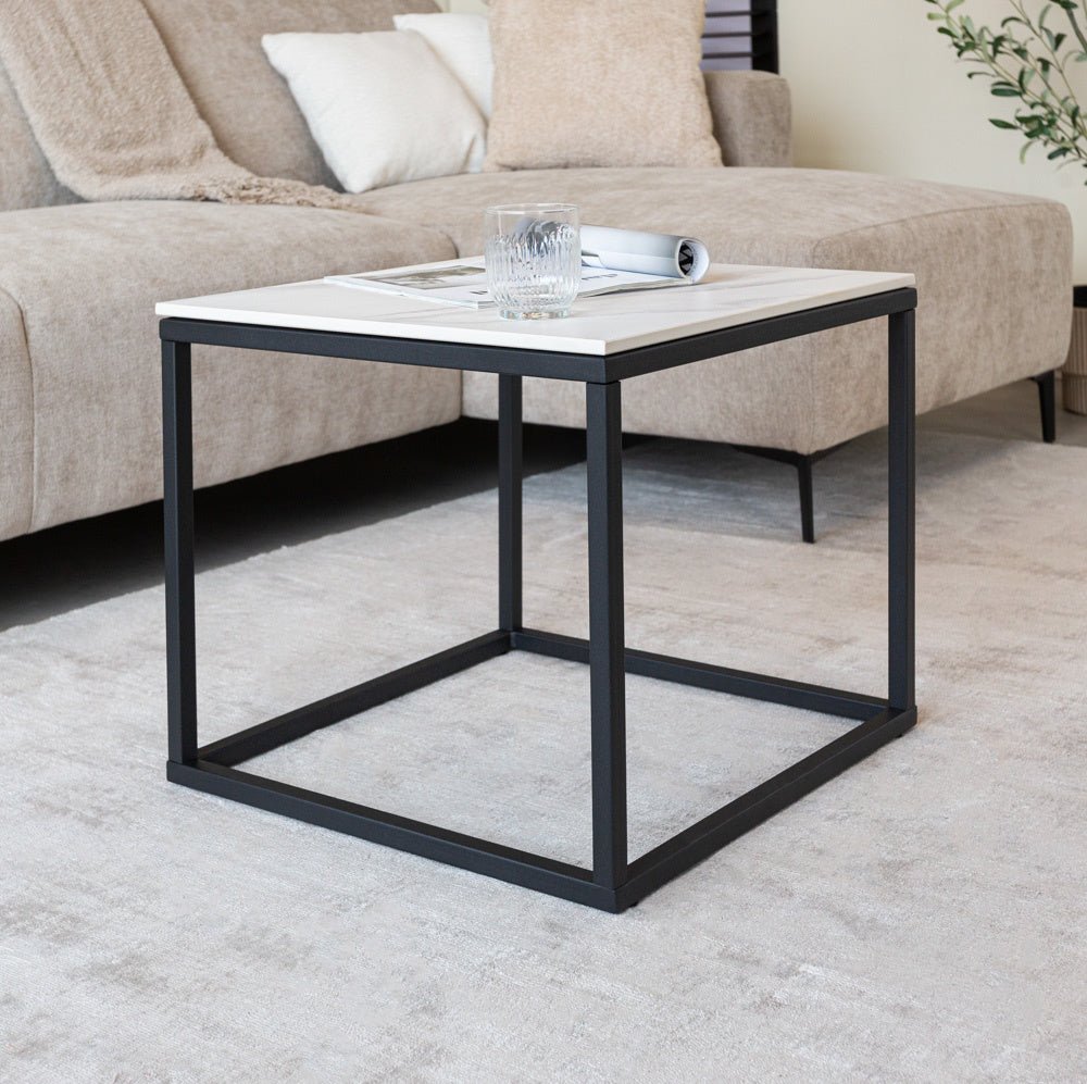 Side table Fien Dimehouse White LxWxH 63x63x10 Sintered stone Atmospheric photo diagonal front view