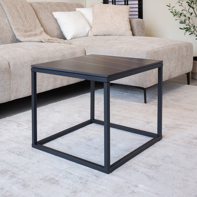 Side table Fien Dimehouse Black LxWxH 63x63x10 Sintered stone Atmospheric photo diagonal front view
