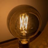 Light source LED filament Sphere Ø12.5 Smoke DH Interior Gray LxWxH 18x13x13 Glass Atmospheric photo diagonal front view